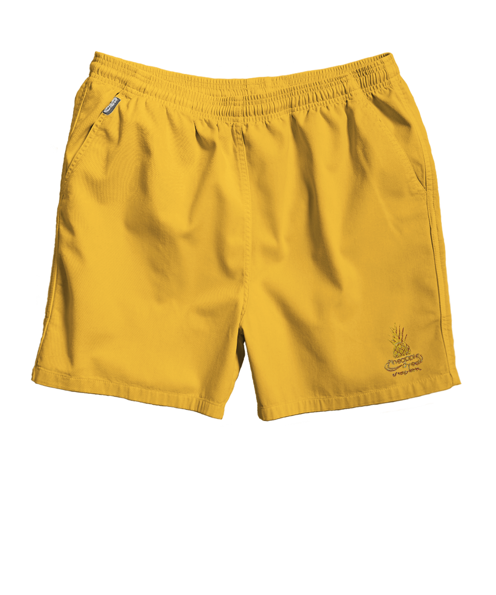 Yellow shorts with a brand logo on a white background View 7