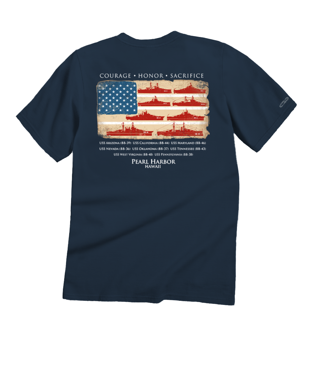 Navy blue t-shirt with Pearl Harbor design featuring American flag and ship silhouettes on a white background.