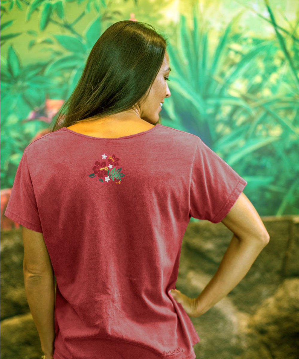 Woman wearing a red scoop neck tee with a small design on the back top of the tee View 3