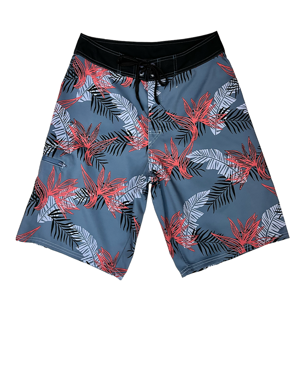 Shorts with a tropical leaf pattern on a blue background View 1