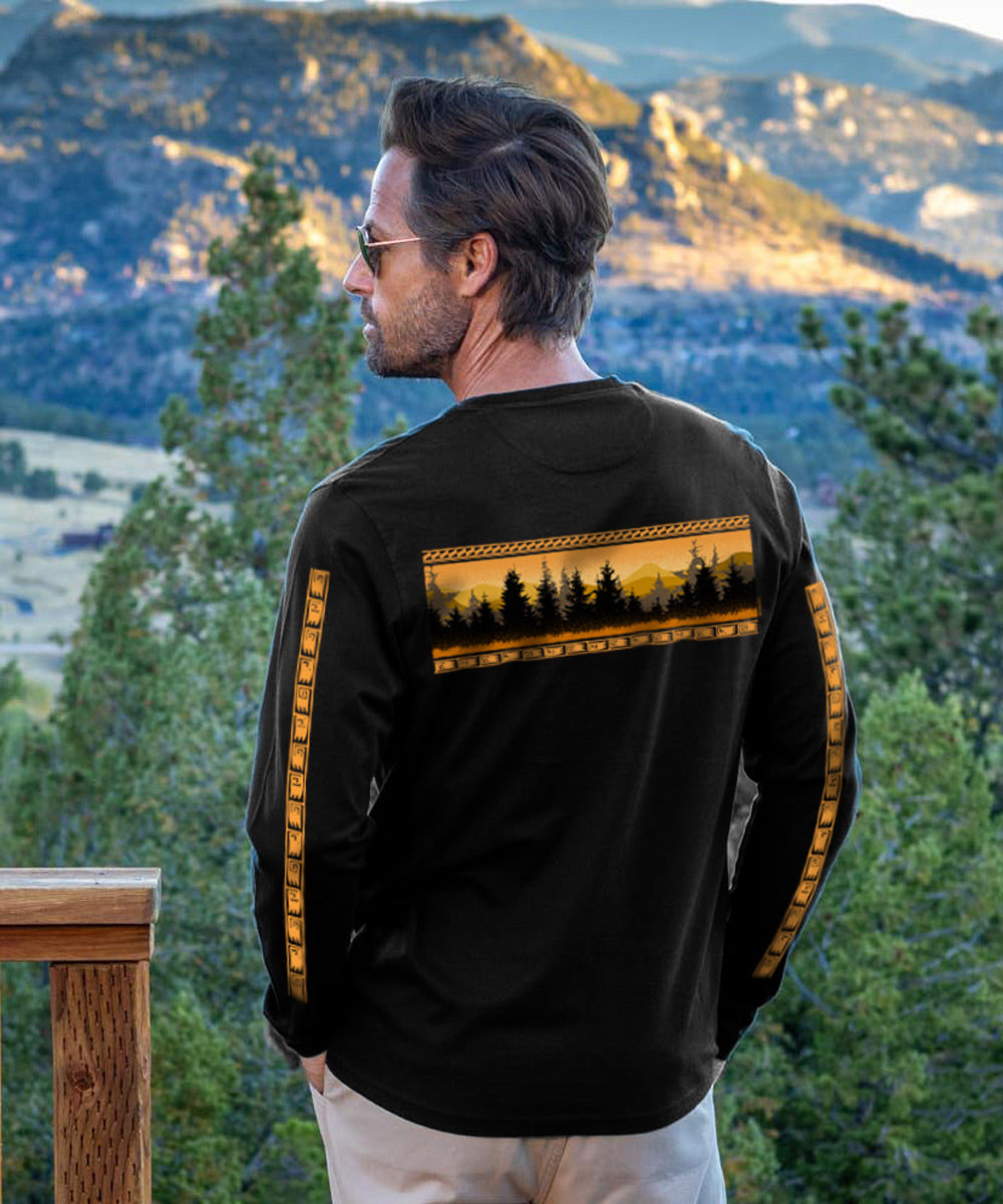 Man wearing long black sleeve shirt in front of mountains View 3