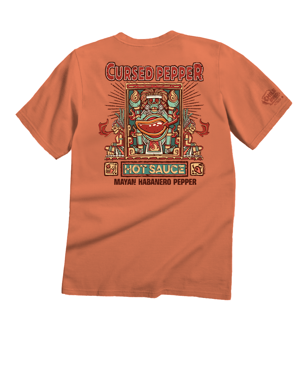Brown t-shirt with colorful graphic design on the back, featuring text 'Cursed Pepper Hot Sauce' and 'Mayan Habanero Pepper'. View 1