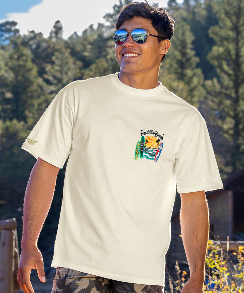 A person wearing a short sleeve crewneck t-shirt with 'Grateful Dead Surfboards - Hawaii' text View 3
