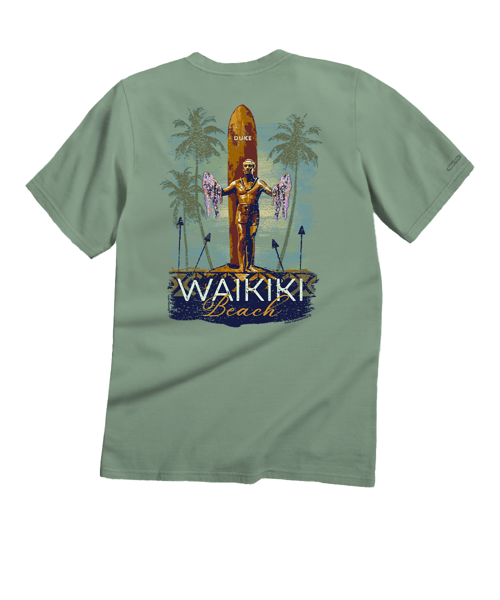 Green t-shirt with a graphic of a statue and surfboard on the back, labeled 'Waikiki Beach'. View 1