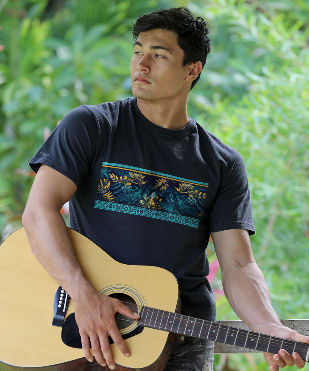 A man holding a guitar and wearing a black short sleeve crewneck t-shirt with a foliage design. View 2