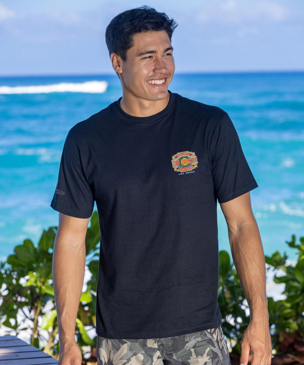 man in black t shirt in front of ocean View 3
