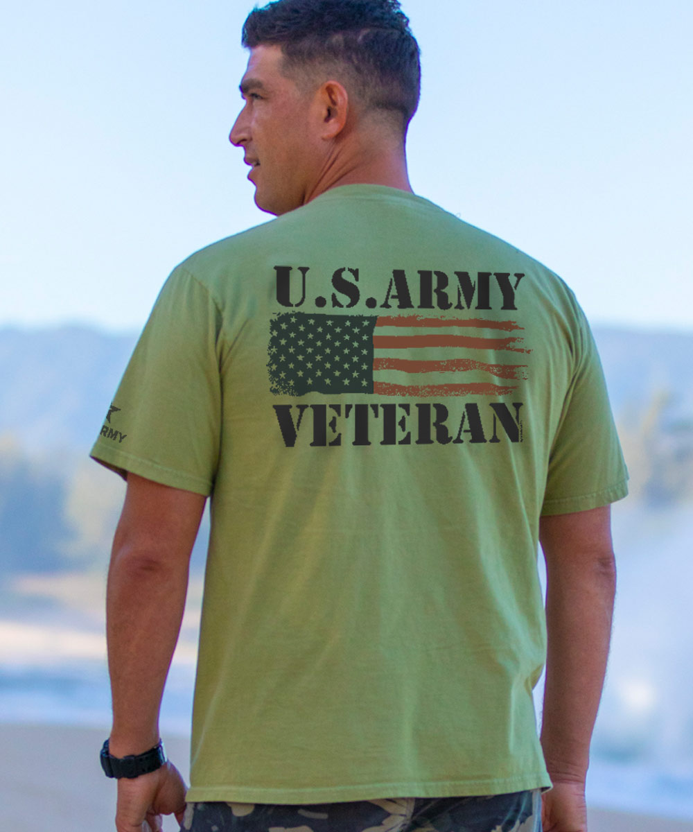 Man wearing a green shirt with US Army Veteran on the back View 2