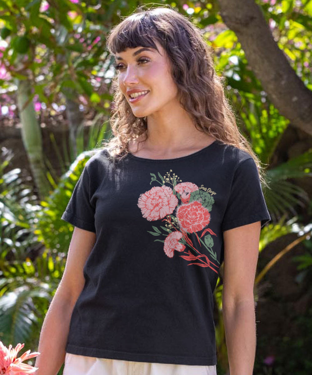 Woman wearing a black t-shirt with floral design outdoors View 2