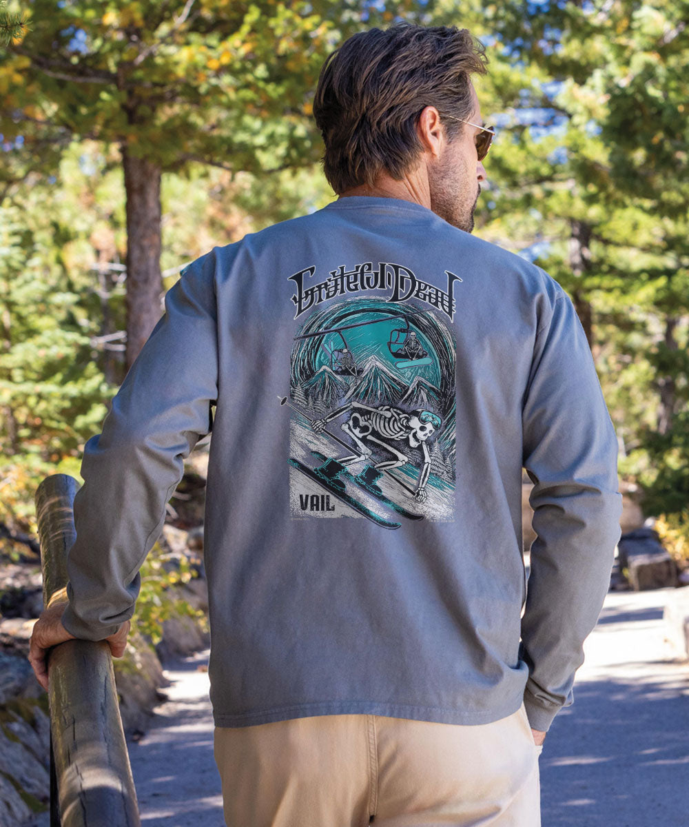 Man wearing a long-sleeve shirt with a graphic design outdoors View 2