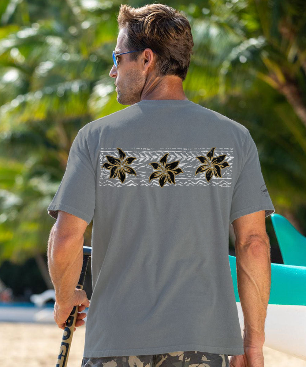 Man wearing a gray t-shirt with a linear floral design on the beach View 3