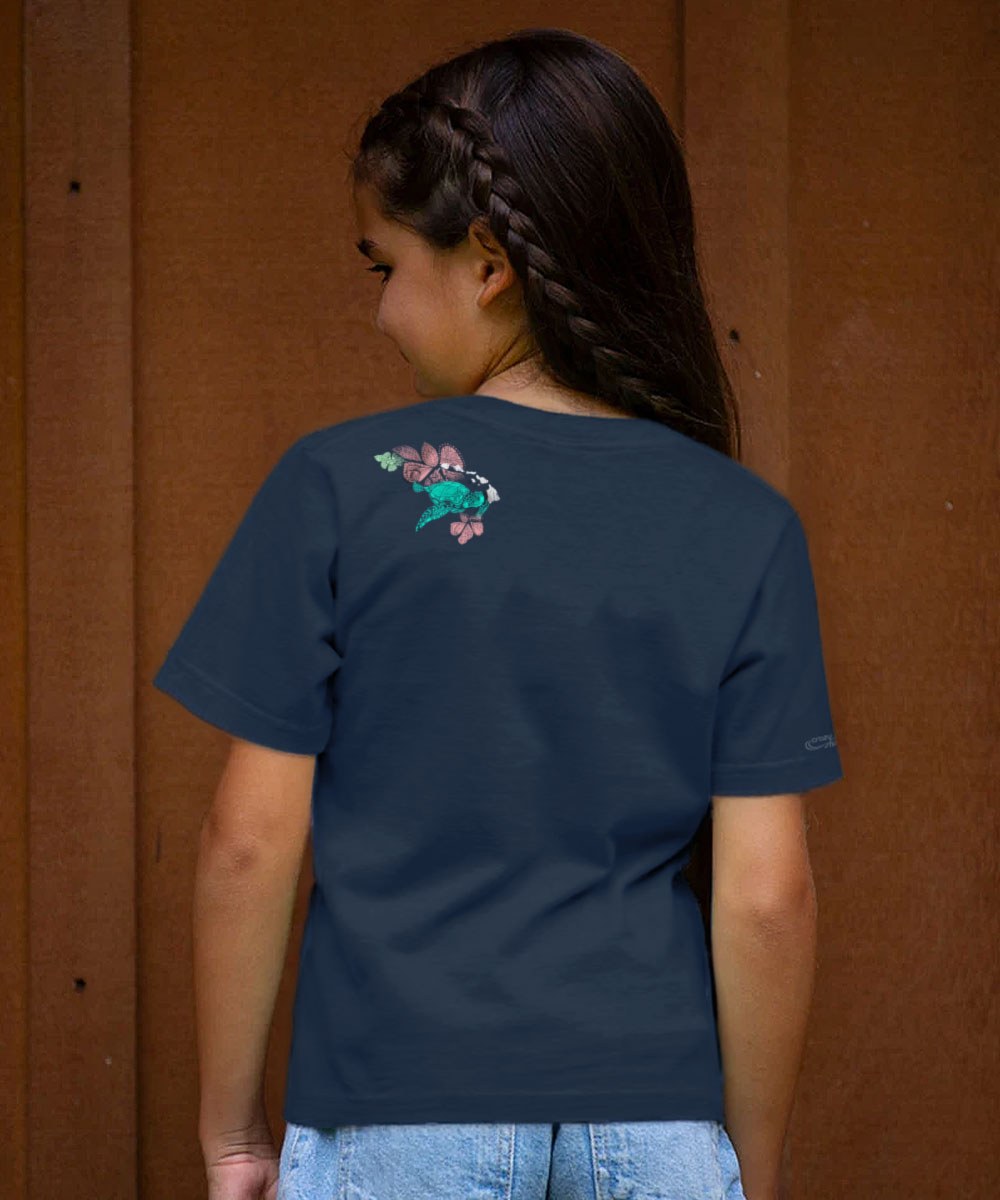 Young girl wearing a blue t-shirt with a floral design on the back View 3