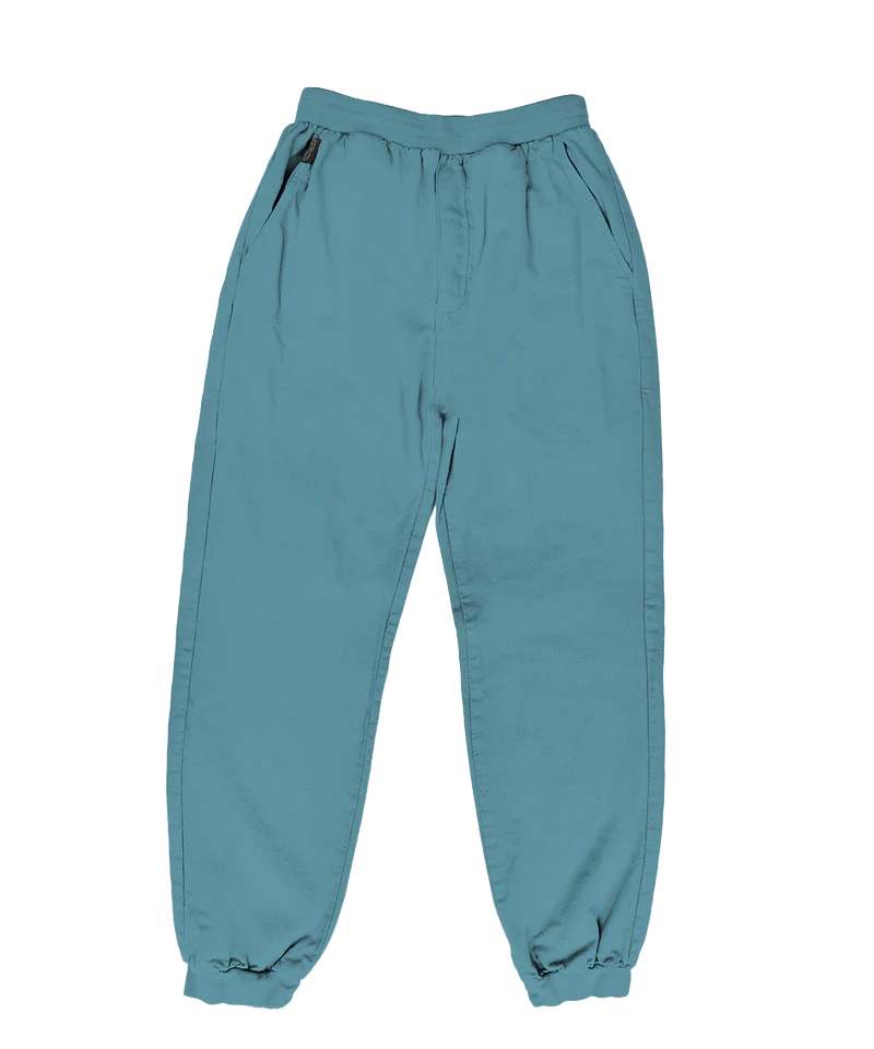 Teal pants on a white background View 19