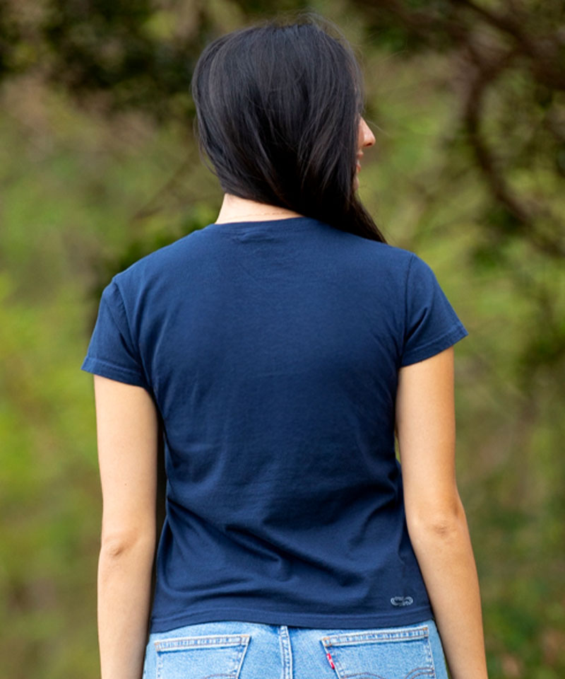 Person wearing a blue t-shirt with a blurred natural background View 3