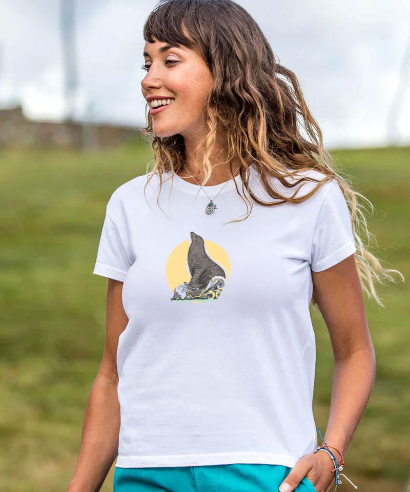 Woman wearing a white t-shirt with a graphic design outdoors View 3