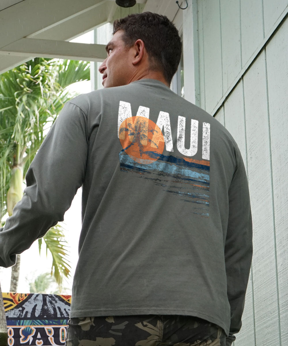 Man wearing a gray long-sleeve shirt with 'MAUI' design on the back, standing outdoors. View 2