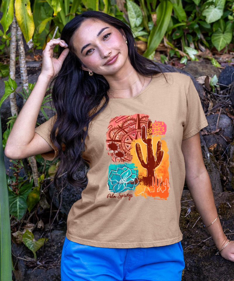 Woman wearing a t-shirt with a cactus design outdoors View 2