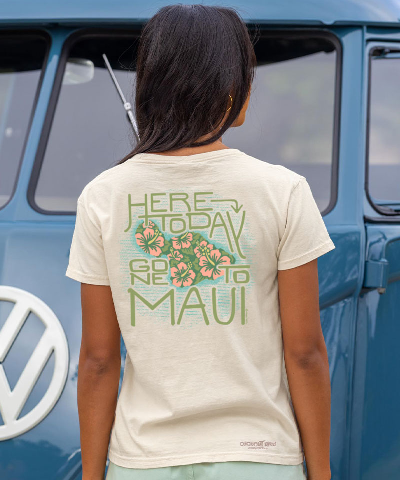 Person wearing a t-shirt with 'Here Today, Gone to Maui' text and floral design, standing in front of a blue Volkswagen van. View 3