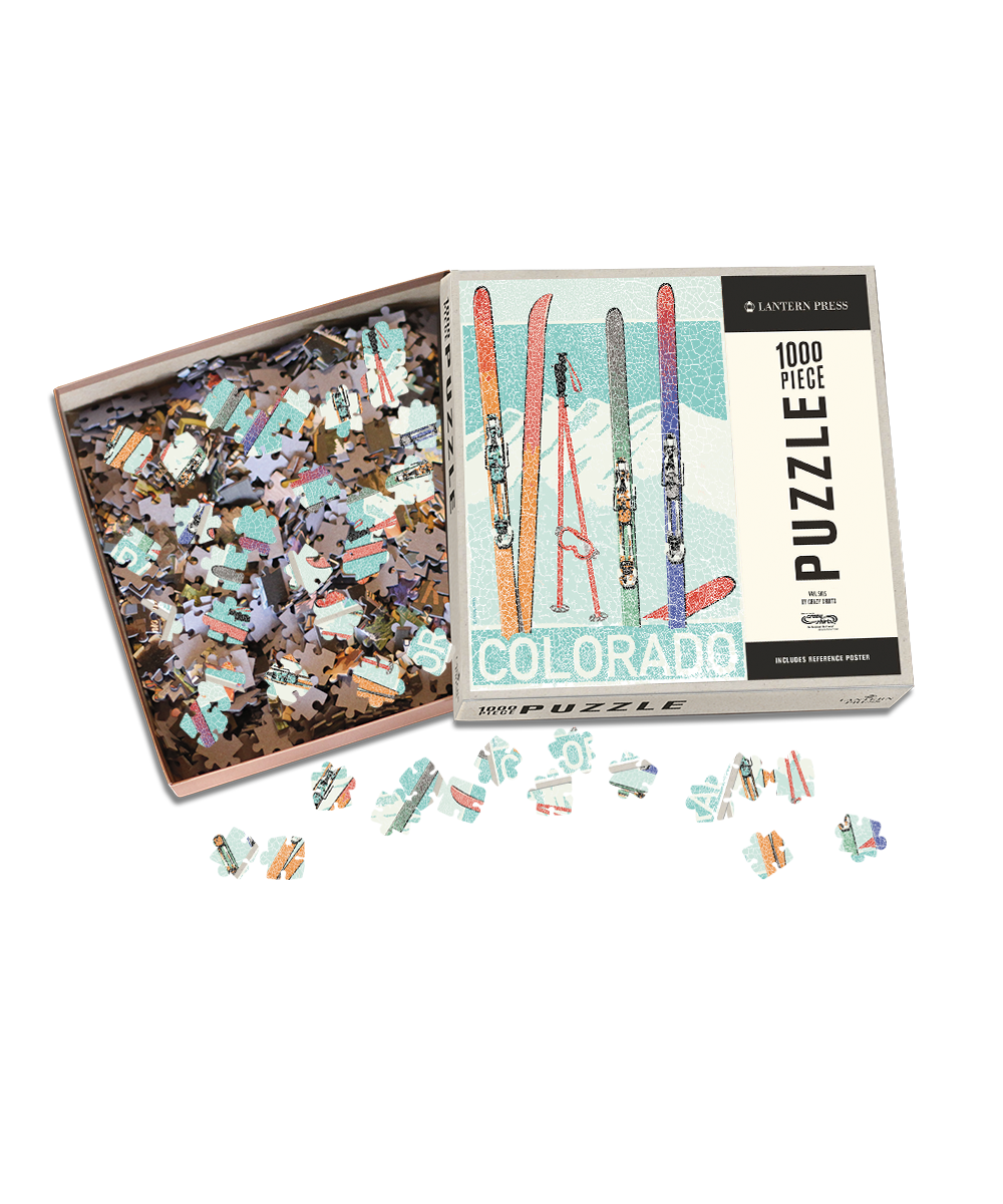 Puzzle box with a Colorado puzzle partially completed puzzle on a white background View 1