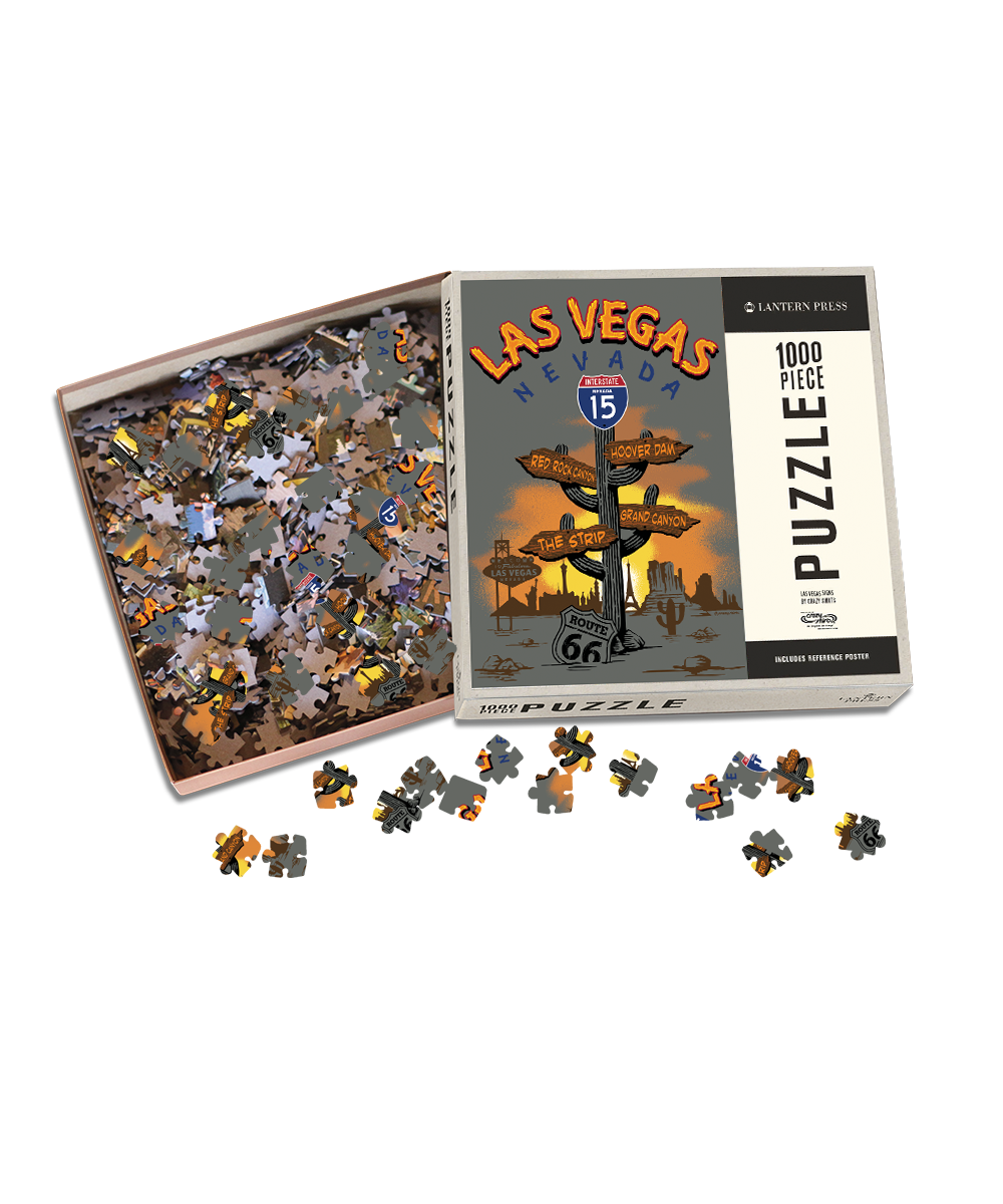 Las Vegas-themed puzzle with pieces and packaging on a white background View 1