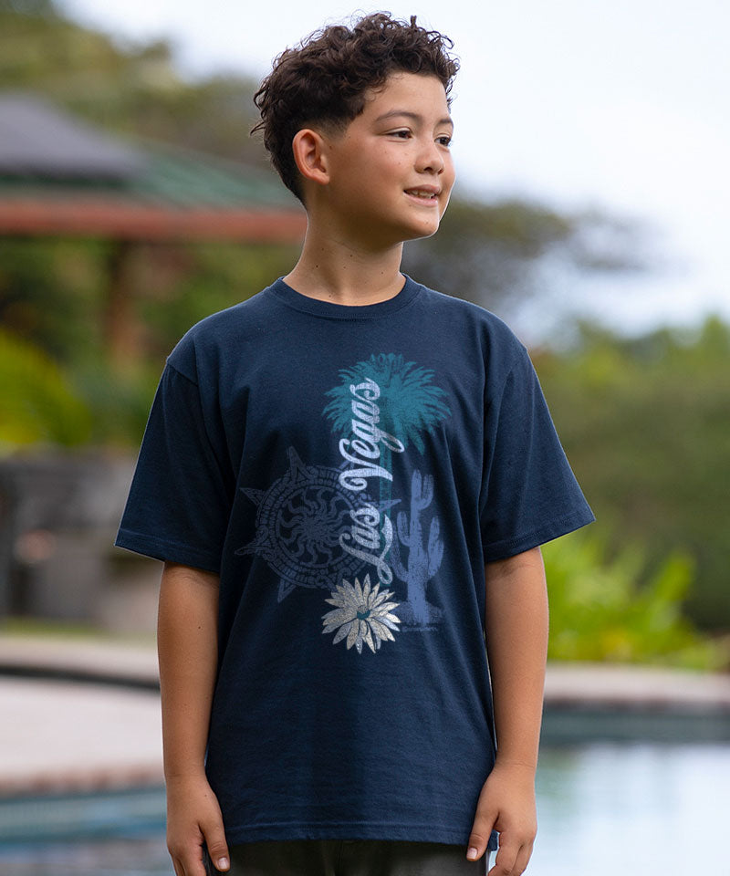 Young boy wearing a navy blue Las Vegas standing in front of a pool View 2