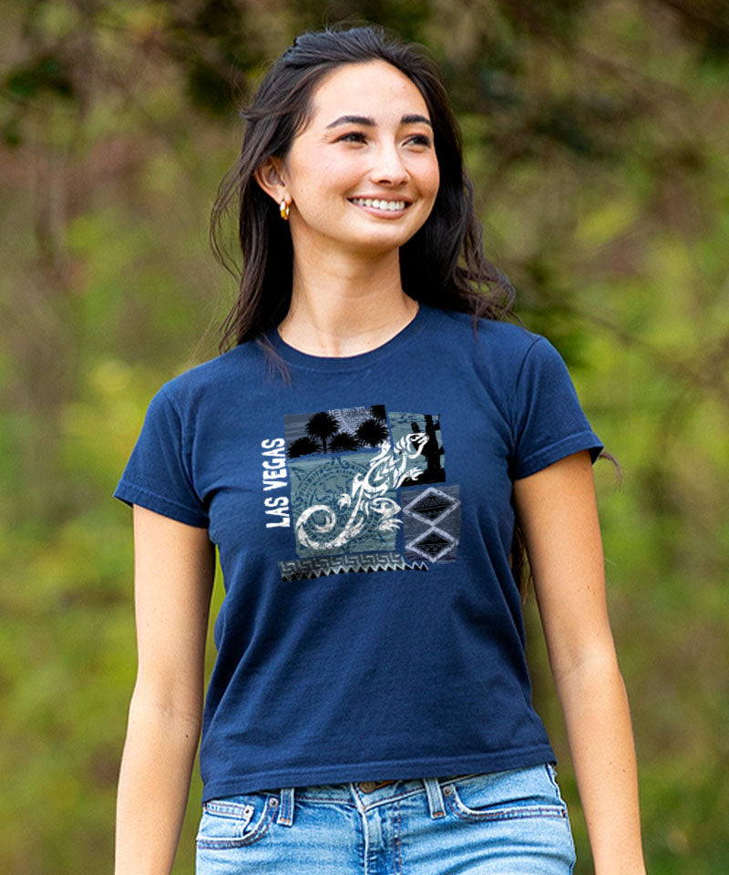 Woman wearing a navy blue t-shirt with a graphic design outdoors View 2