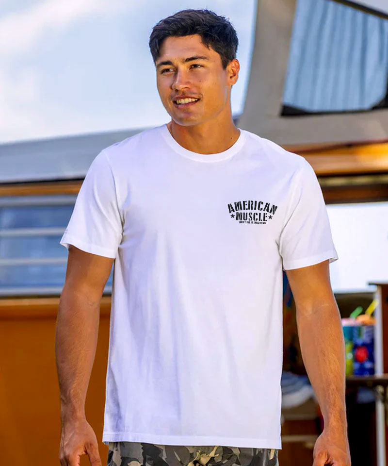 Man wearing a white t-shirt with 'American Muscle' logo outdoors View 3