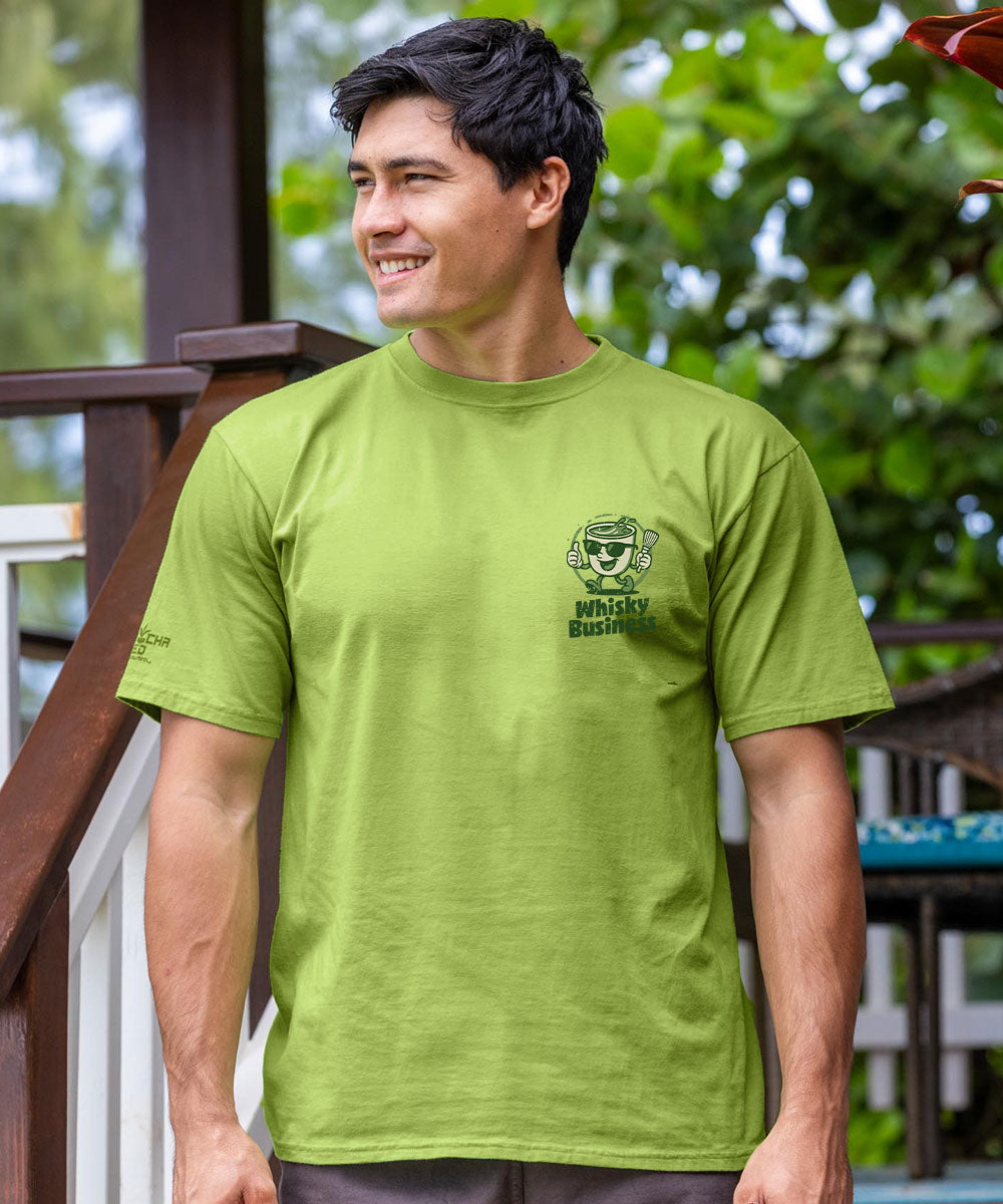 Man wearing a green t-shirt with a logo outdoors View 3