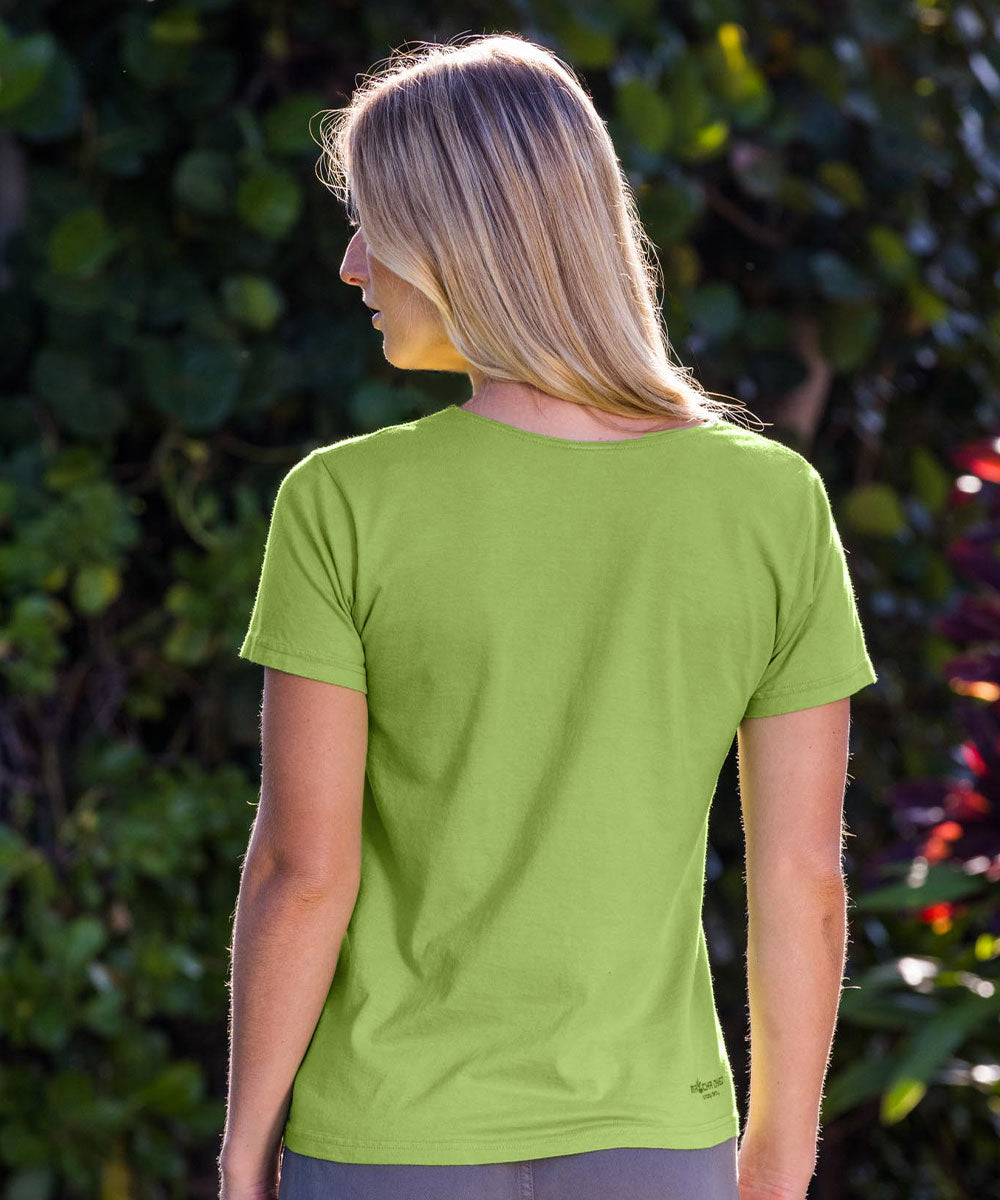 Person wearing a green t-shirt with a blurred natural background View 3