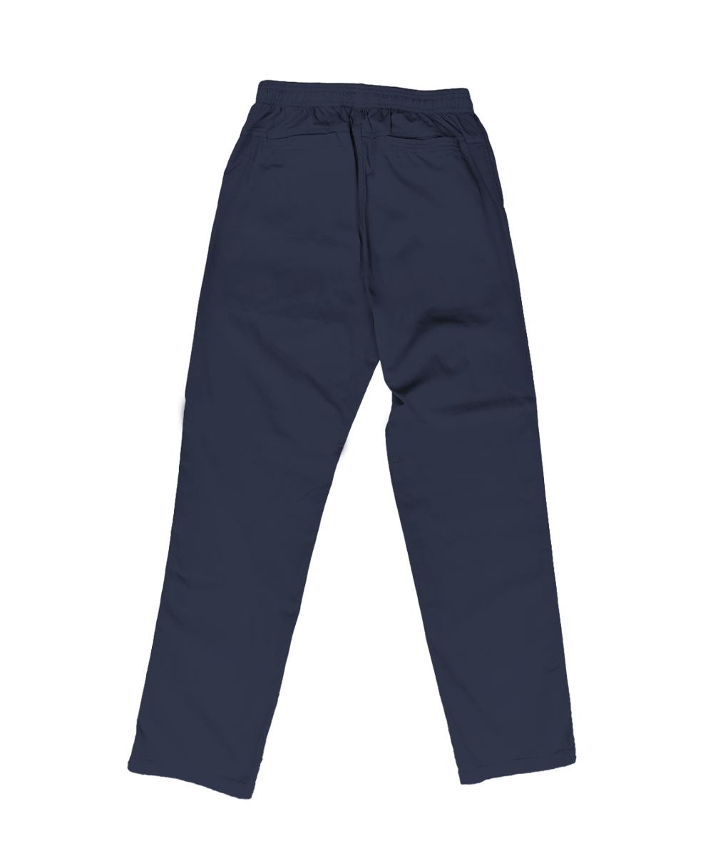 A pair of dark navy blue pants shown from the back, featuring an elastic waistband and zippered back pockets, laid flat against a white background. View 4