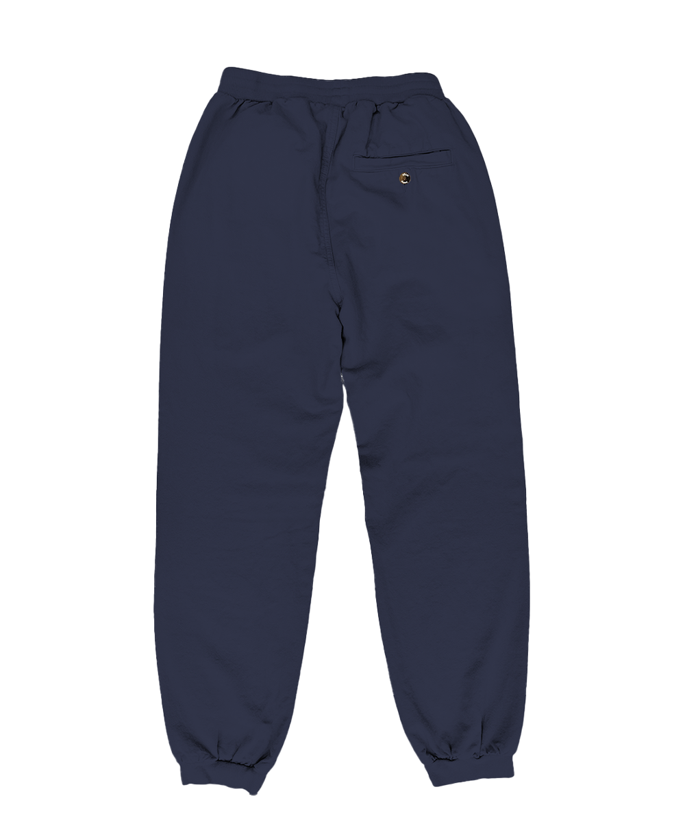 A pair of dark navy blue sweatpants with an elastic waistband, drawstring, and elastic cuffs, featuring a small yellow embroidered logo on the left hip. View 4