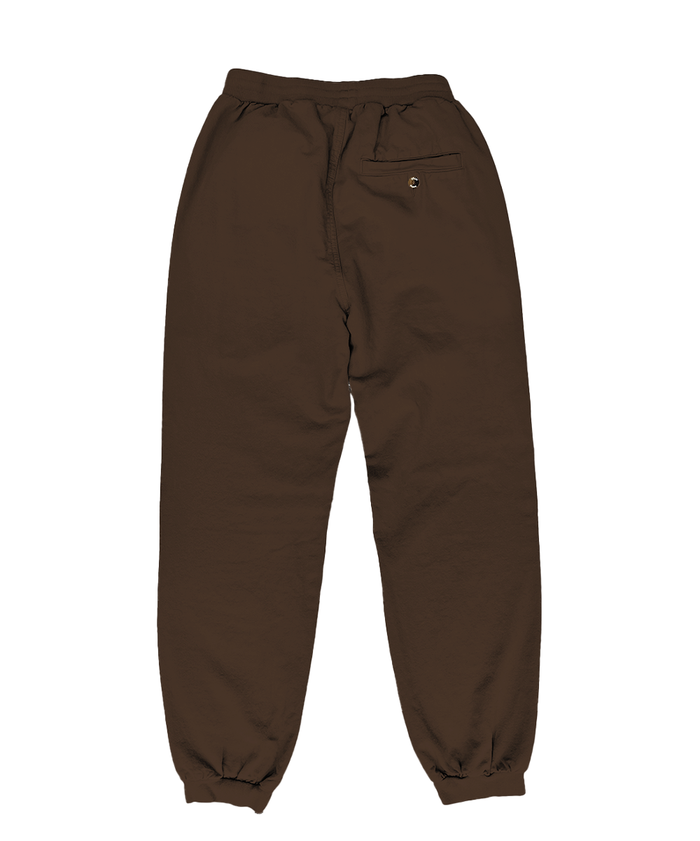 A pair of light taupe drawstring sweatpants with elastic cuffs, shown flat against a solid white background. View 4