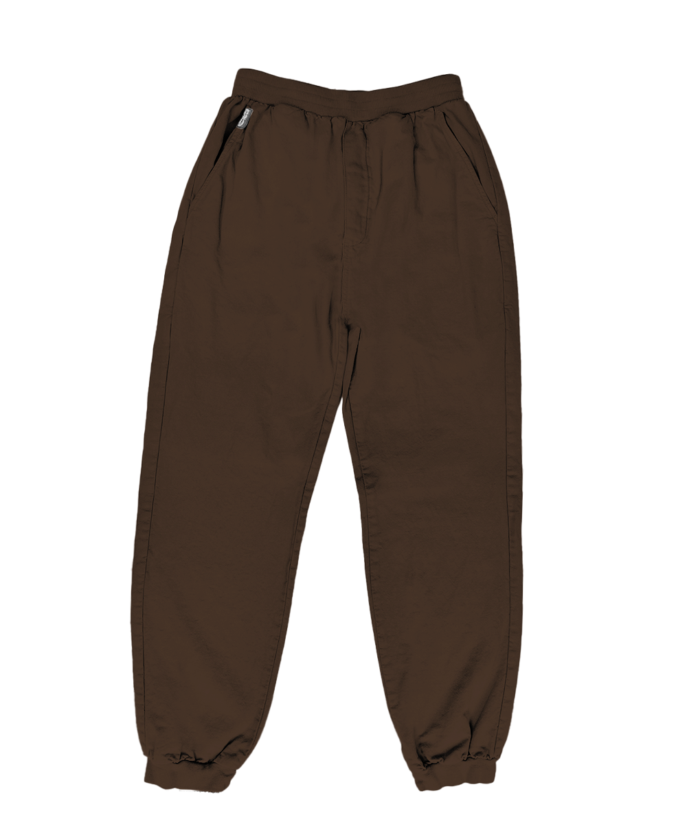 A pair of relaxed-fit jogger pants in a muted taupe-gray color, featuring an elastic waistband and cuffed ankles, laid flat against a white background. View 3