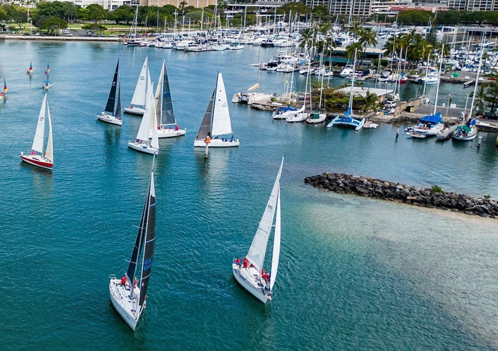 Boats sailing along in Ala Moana Harbor