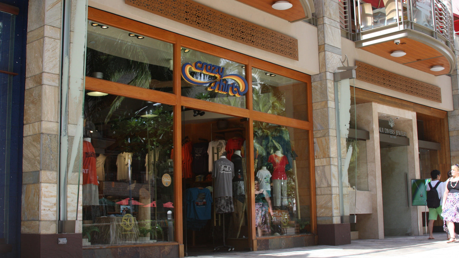 Waikiki beach Walk Storefront with glass windows displaying mannequins