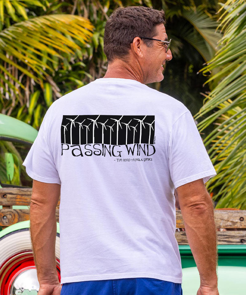 Man wearing white t-shirt with windmill graphic standing in front of vintage truck View 2