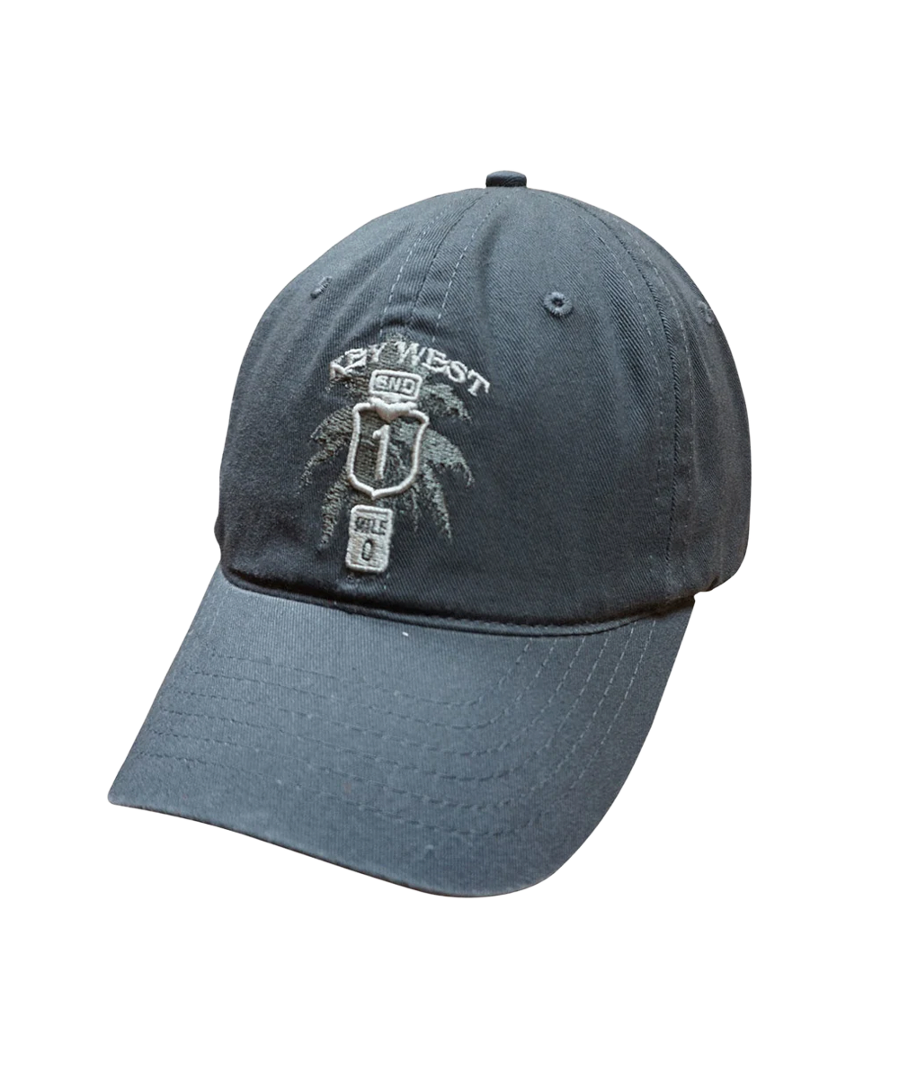 Blue cap with embroidered design on a white background View 1