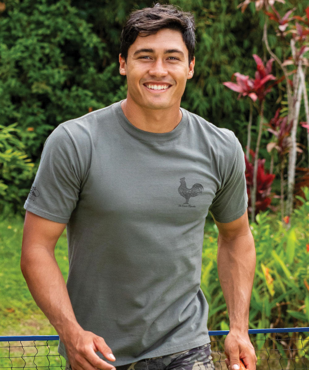 Man wearing a gray t-shirt with a rooster logo outdoors View 3