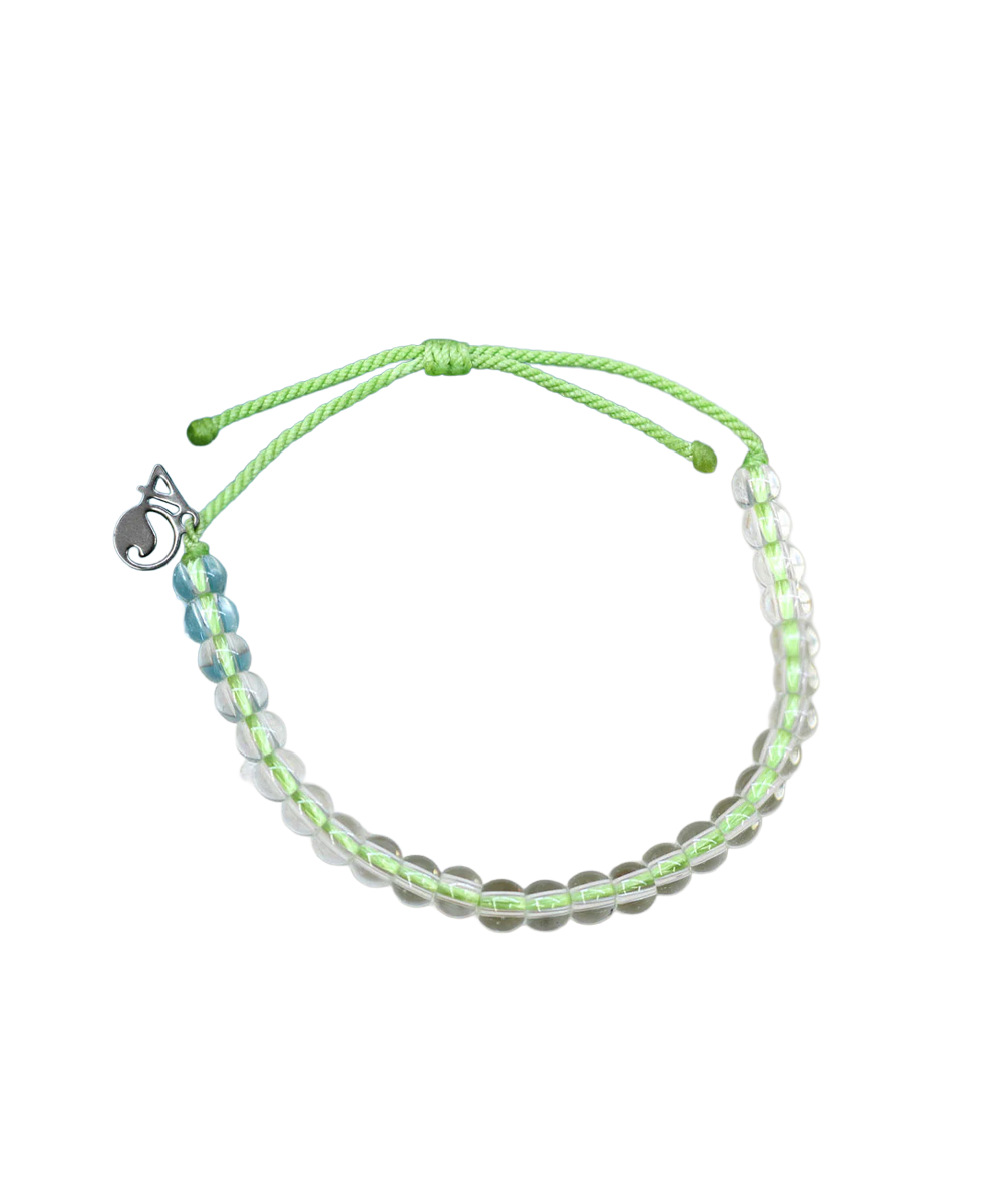 Green beaded bracelet with a silver clasp on a white background View 1