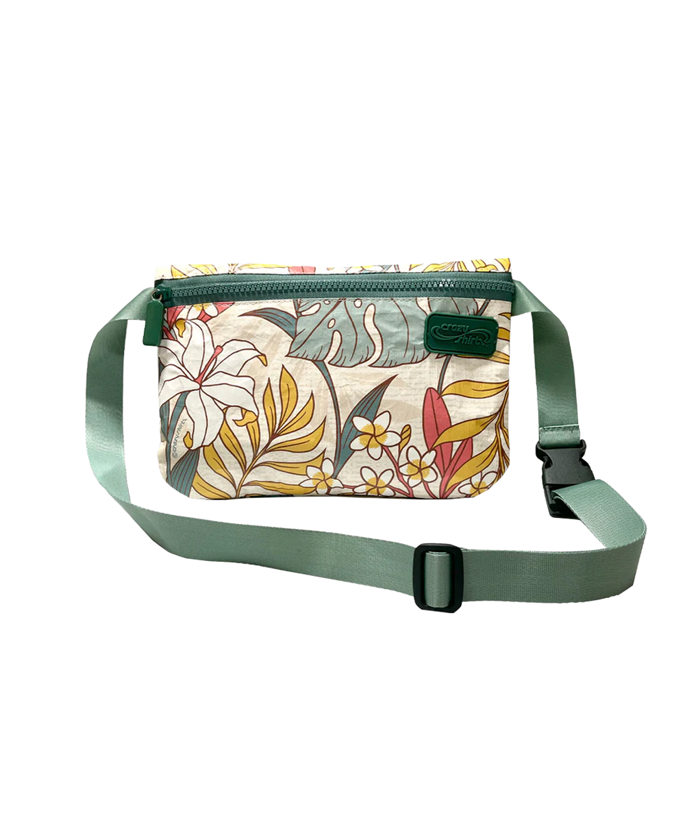 Floral-patterned waist bag with green strap on a white background View 1