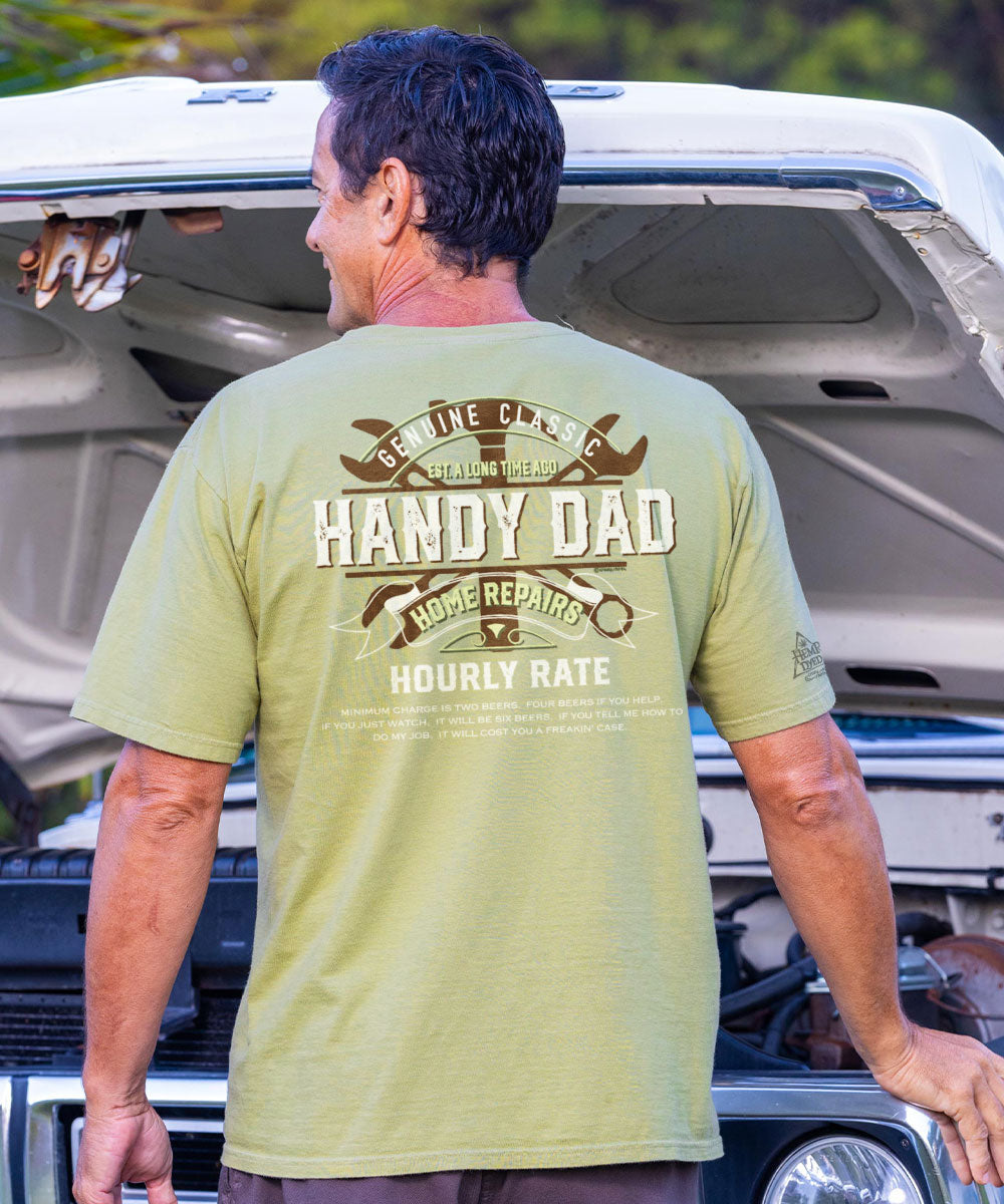 man wearing a green shirt with a large graphic on the back