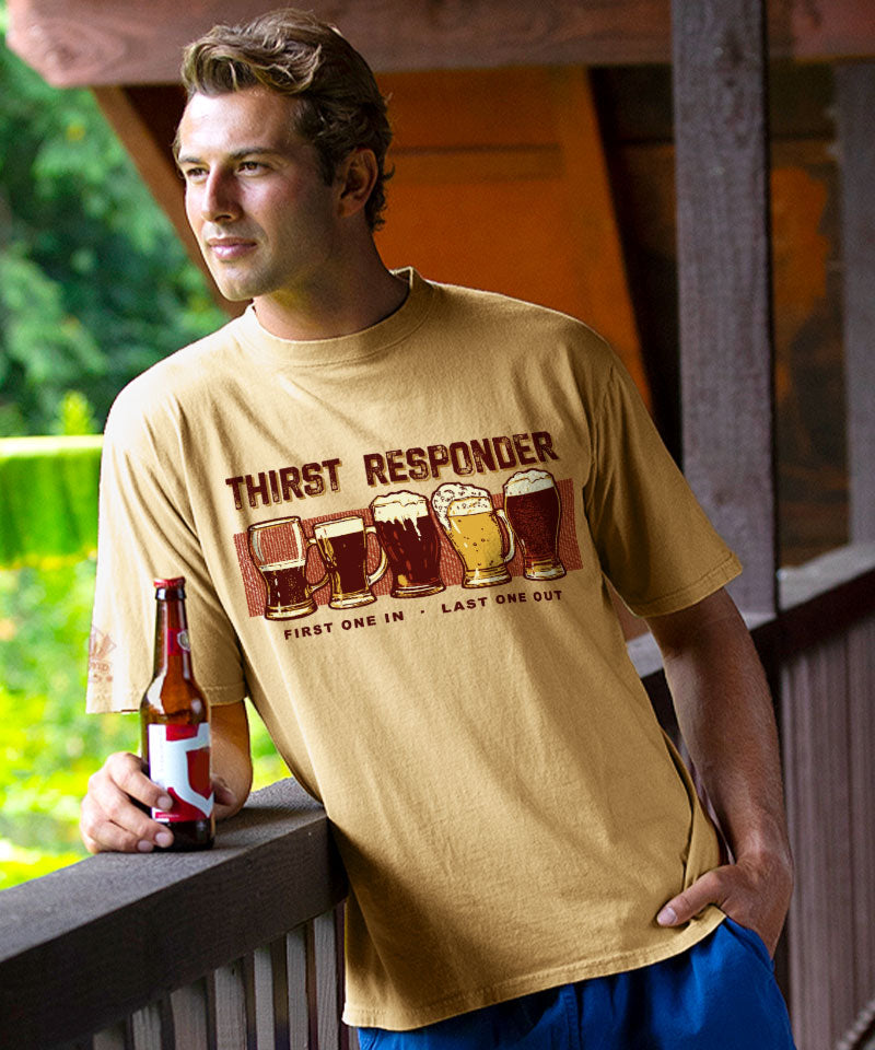 Man wearing a 'Thirst Responder' t-shirt holding a beer bottle outdoors. View 2