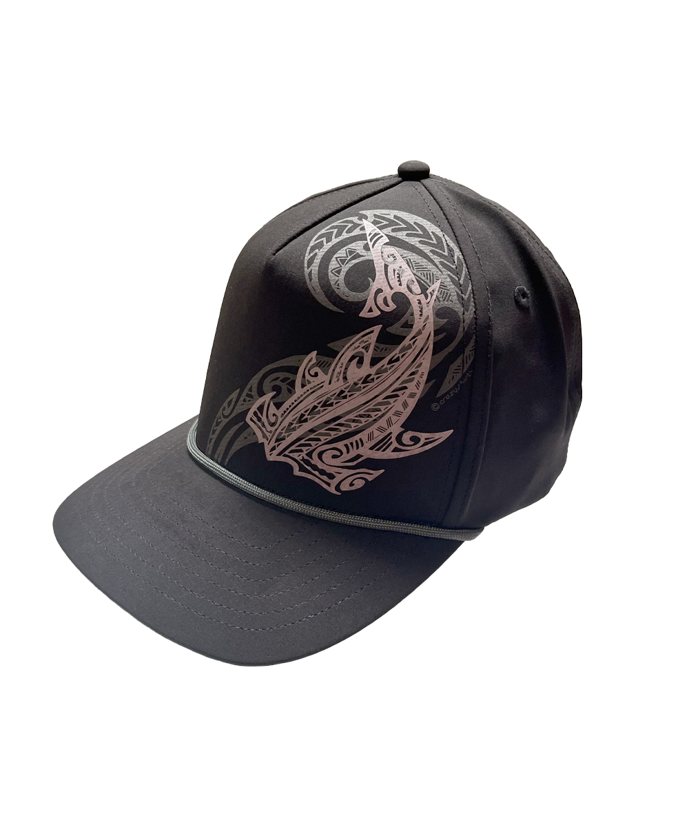 Black cap with intricate white and rose gold design on a white background View 1