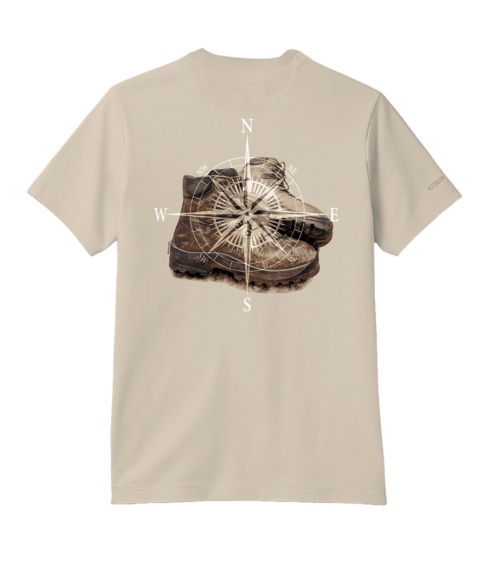 Beige t-shirt with a graphic of a boot and compass on the back, on a white background View 1