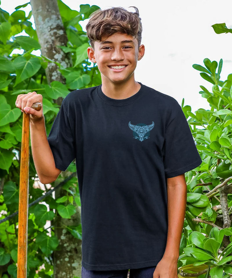 Person wearing a black t-shirt with a blue graphic in a natural setting View 3