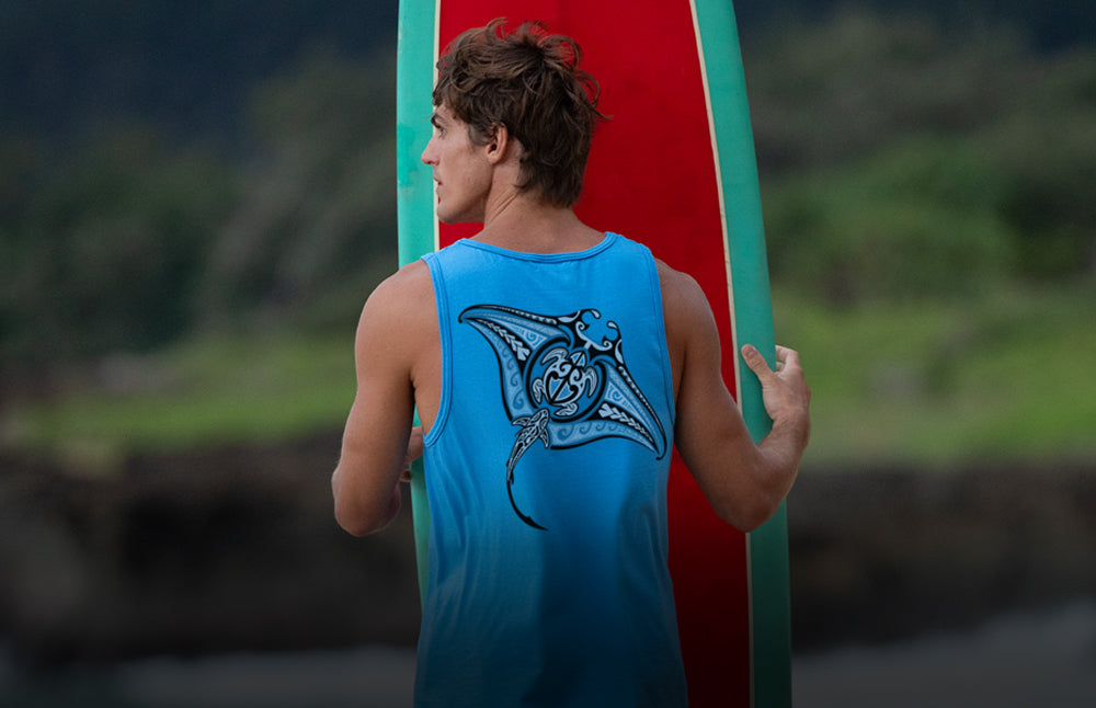 Man holding a surfboard with a blurred natural background