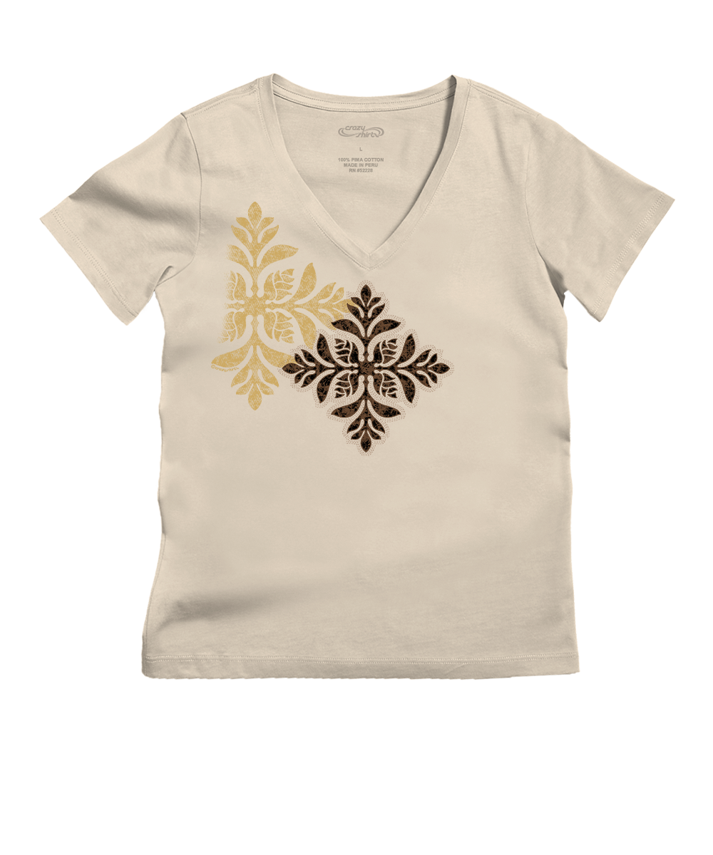 Beige t-shirt with decorative quilt design on a white background View 1