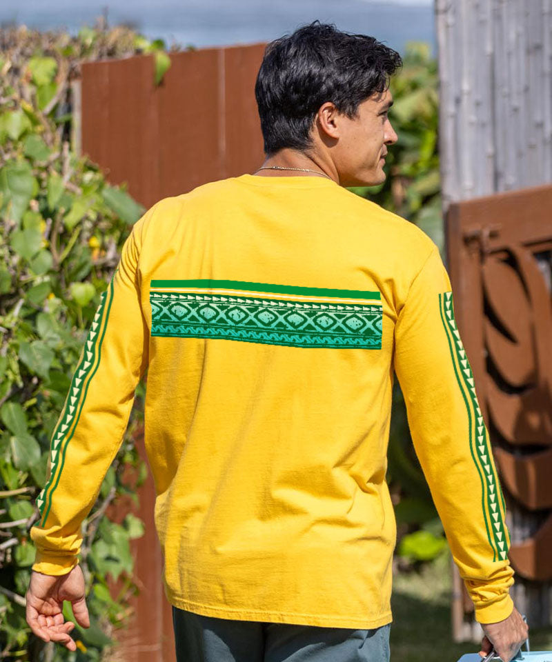 Man wearing a yellow long-sleeve shirt with green accents outdoors View 3