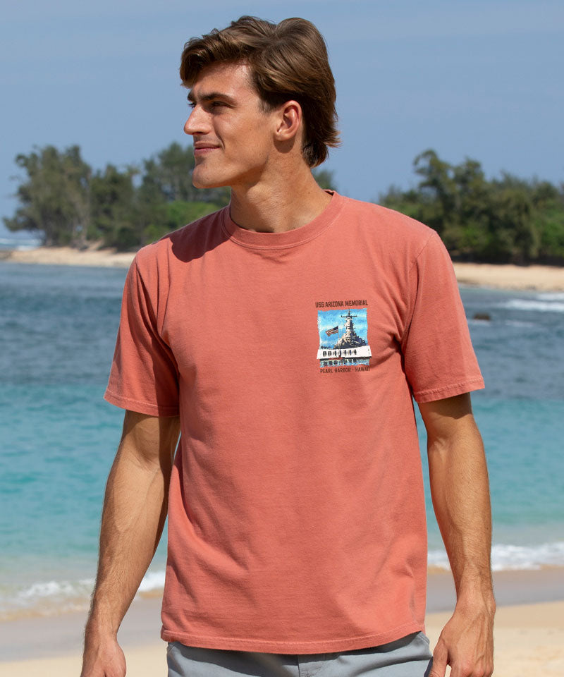 Man wearing a red t-shirt with a graphic design on a beach View 3