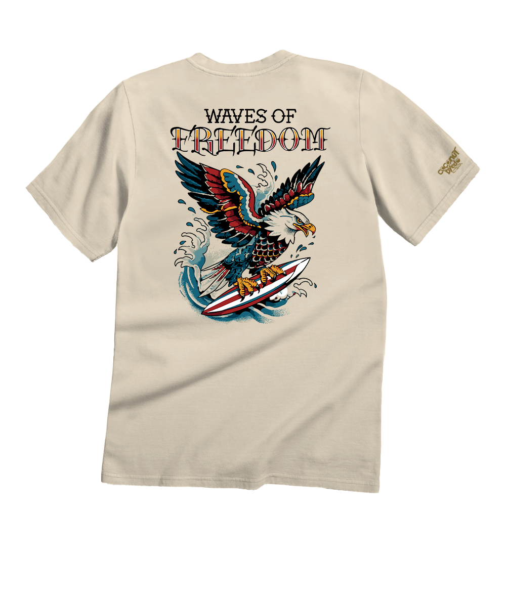 Beige t-shirt with eagle and surfboard design on a white background View 1