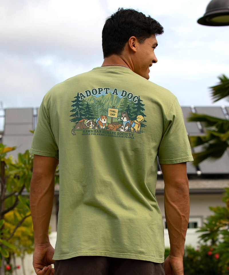 Person wearing a green t-shirt with 'Adopt a Dog' graphic on the back, standing outdoors. View 3